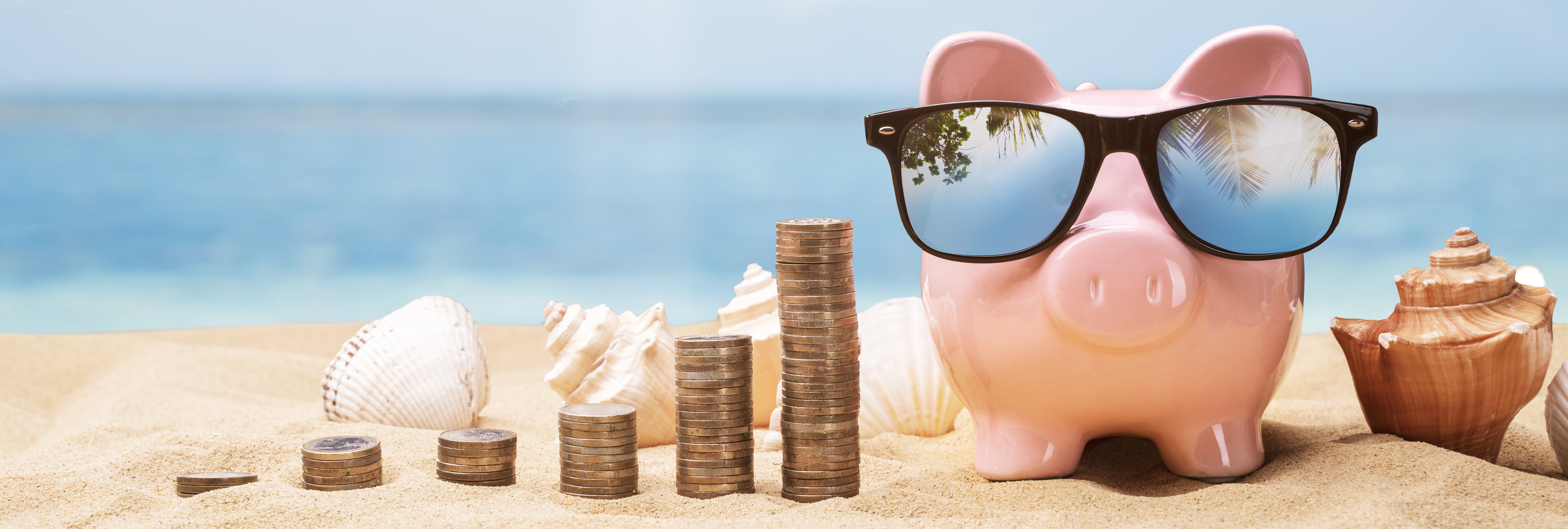 piggy bank on the beach